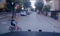 Eskişehir'de bisikletli çocuk faciadan döndü: Yürekleri ağza getiren anlar